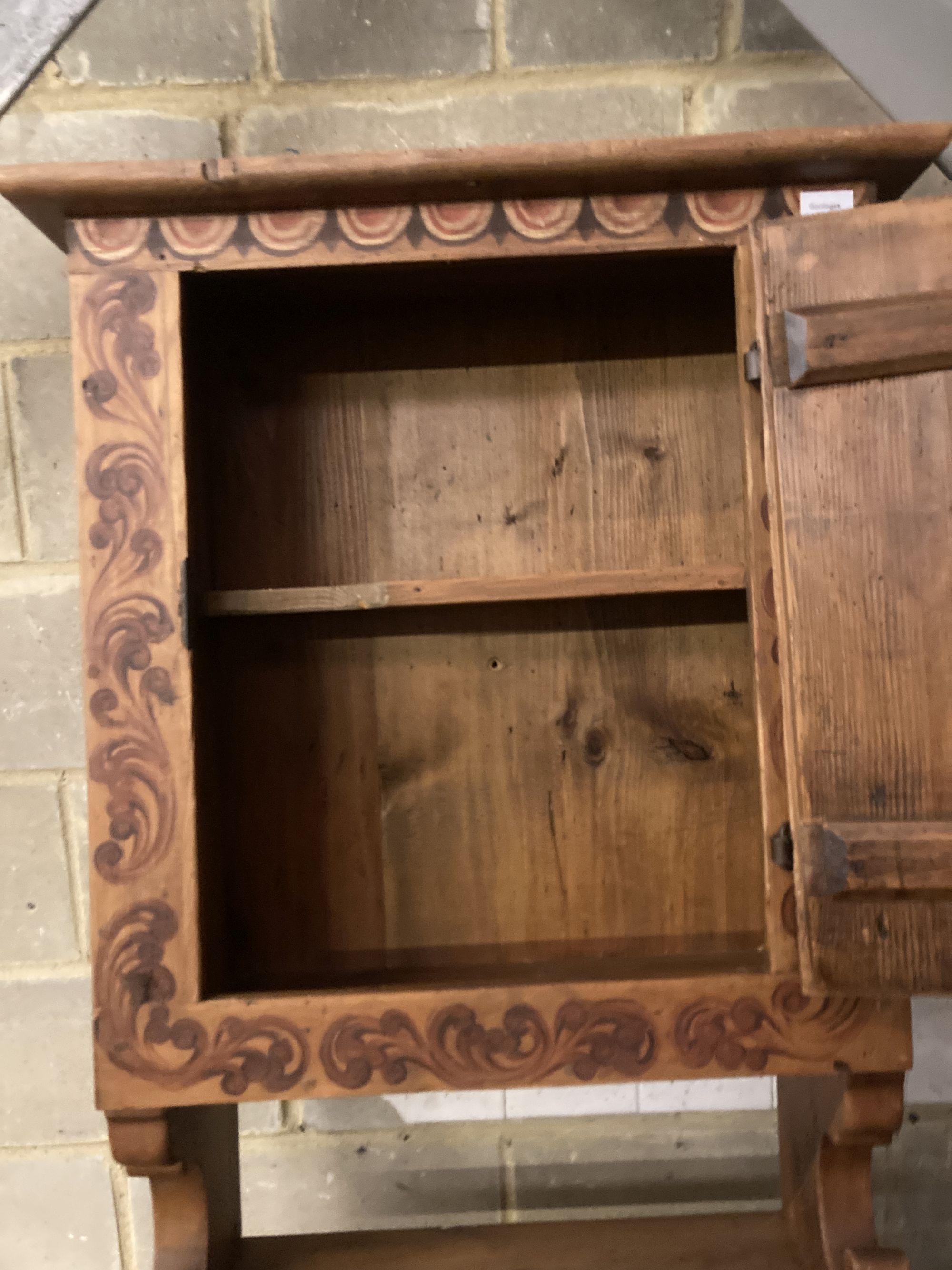 A Swiss painted pine hunting cabinet, width 70cm, height 190cm